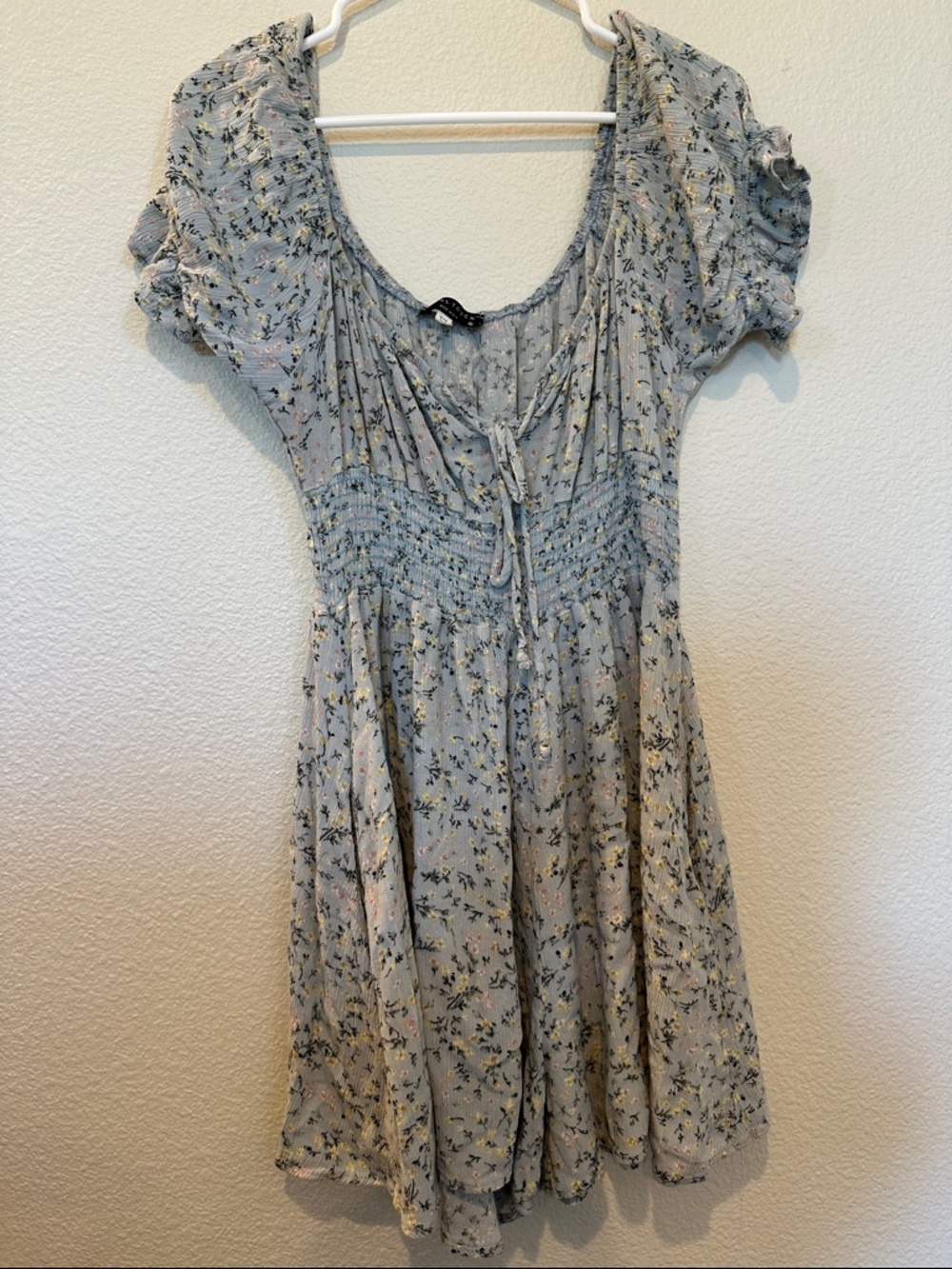 Final Touch Pale Blue Floral Smocked Waist Romper with pockets